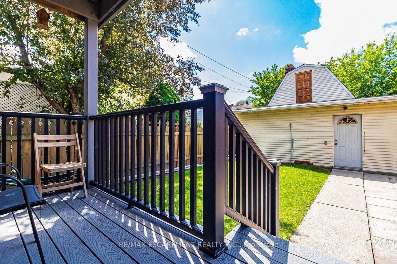 Rear Deck overlooking backyard and Garages