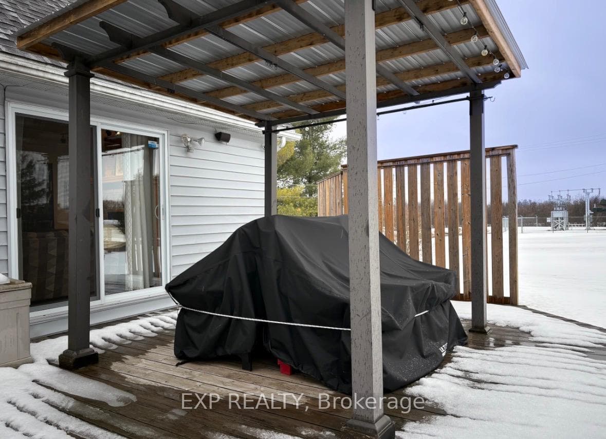 covered back deck off the outdoor kitchen