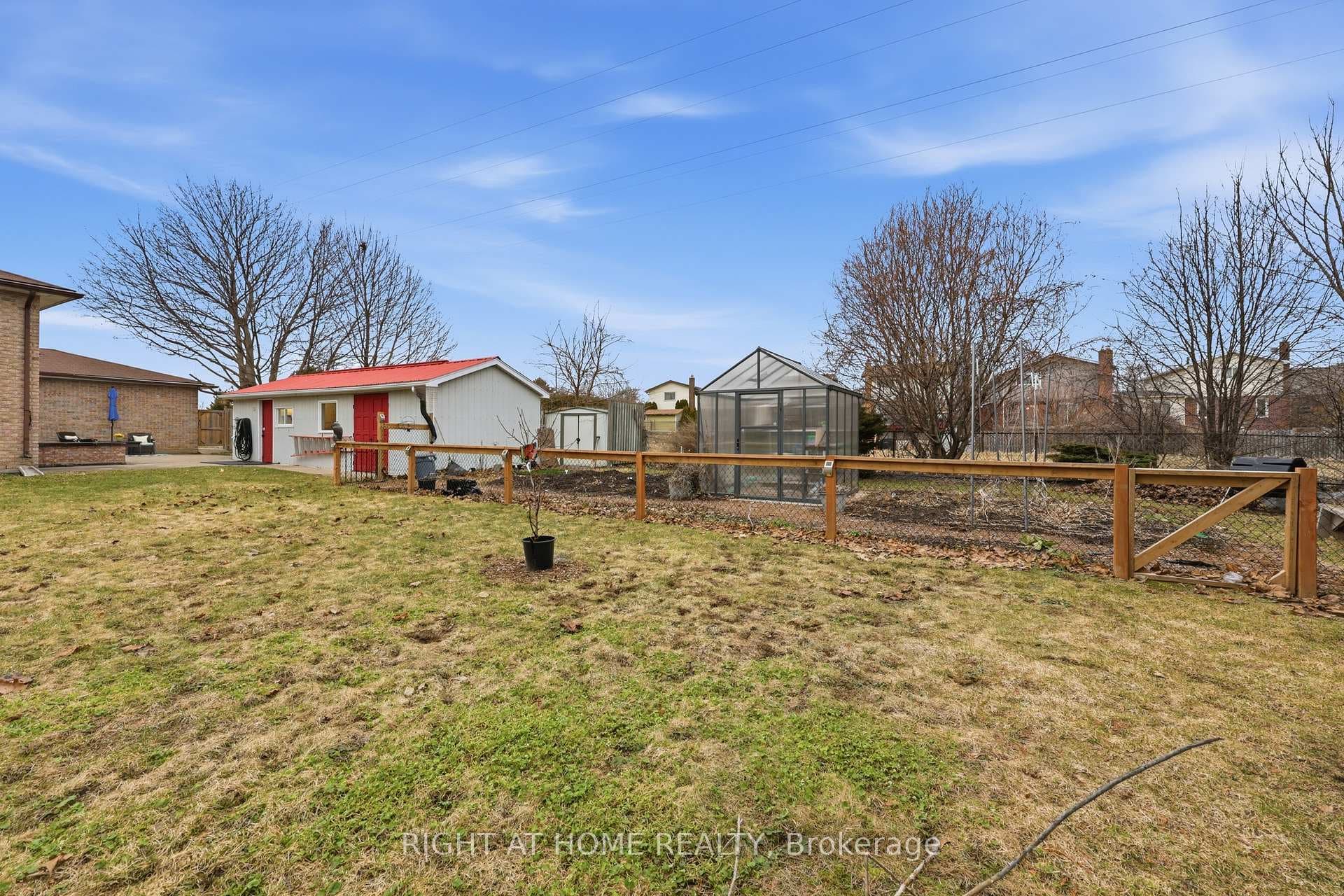 Large vegetable garden with greenhouse