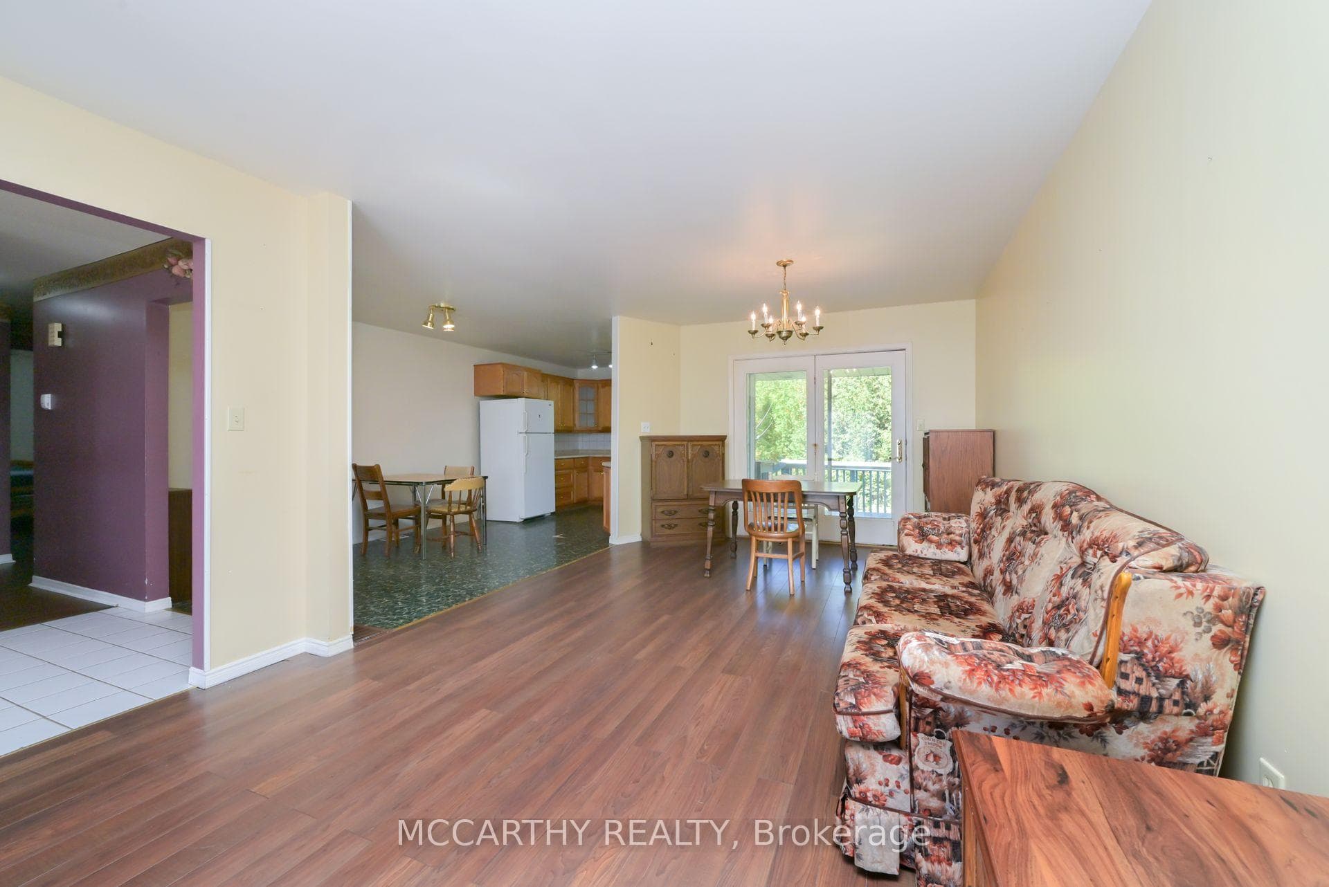 Long Living room with walk out to back yard