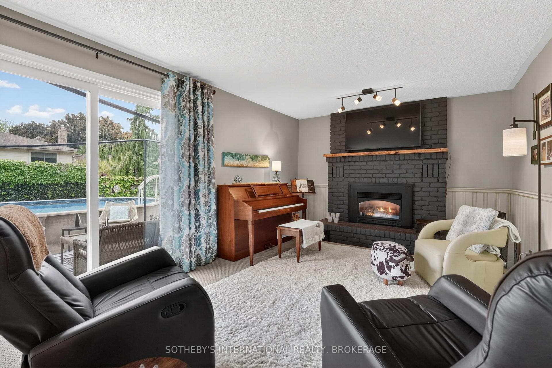 Main floor family room with doors to backyard
