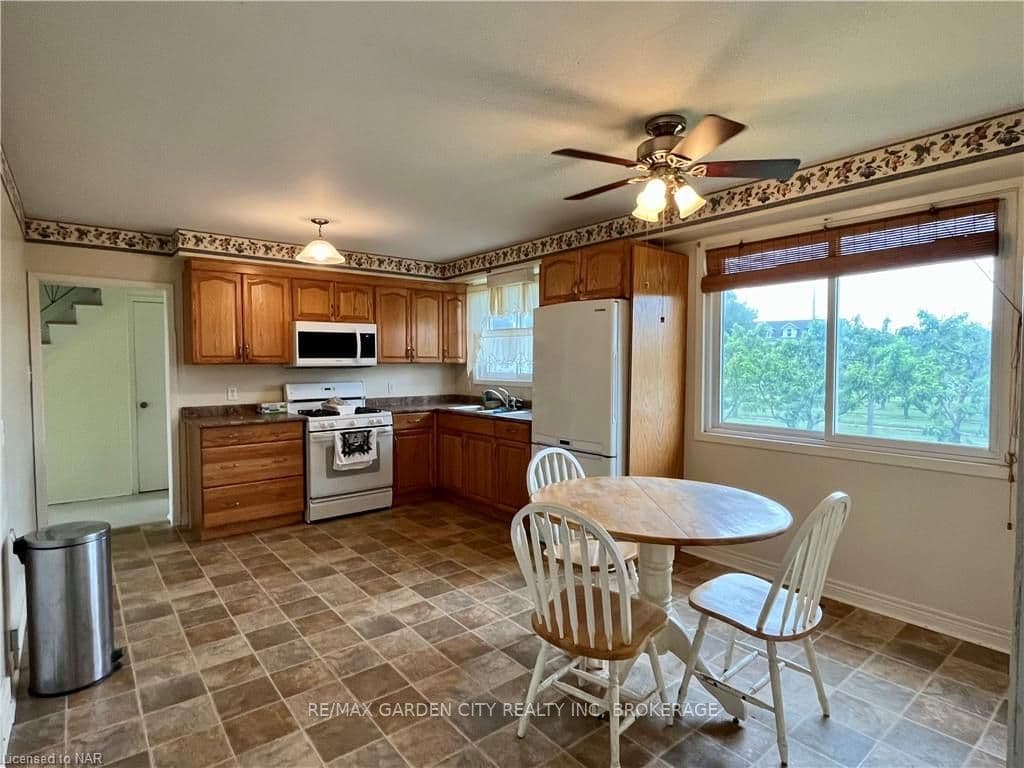 Eat in kitchen with orchard views