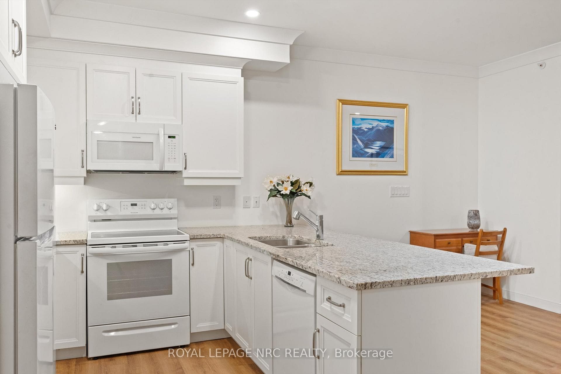 White cabinetry & granite counters
