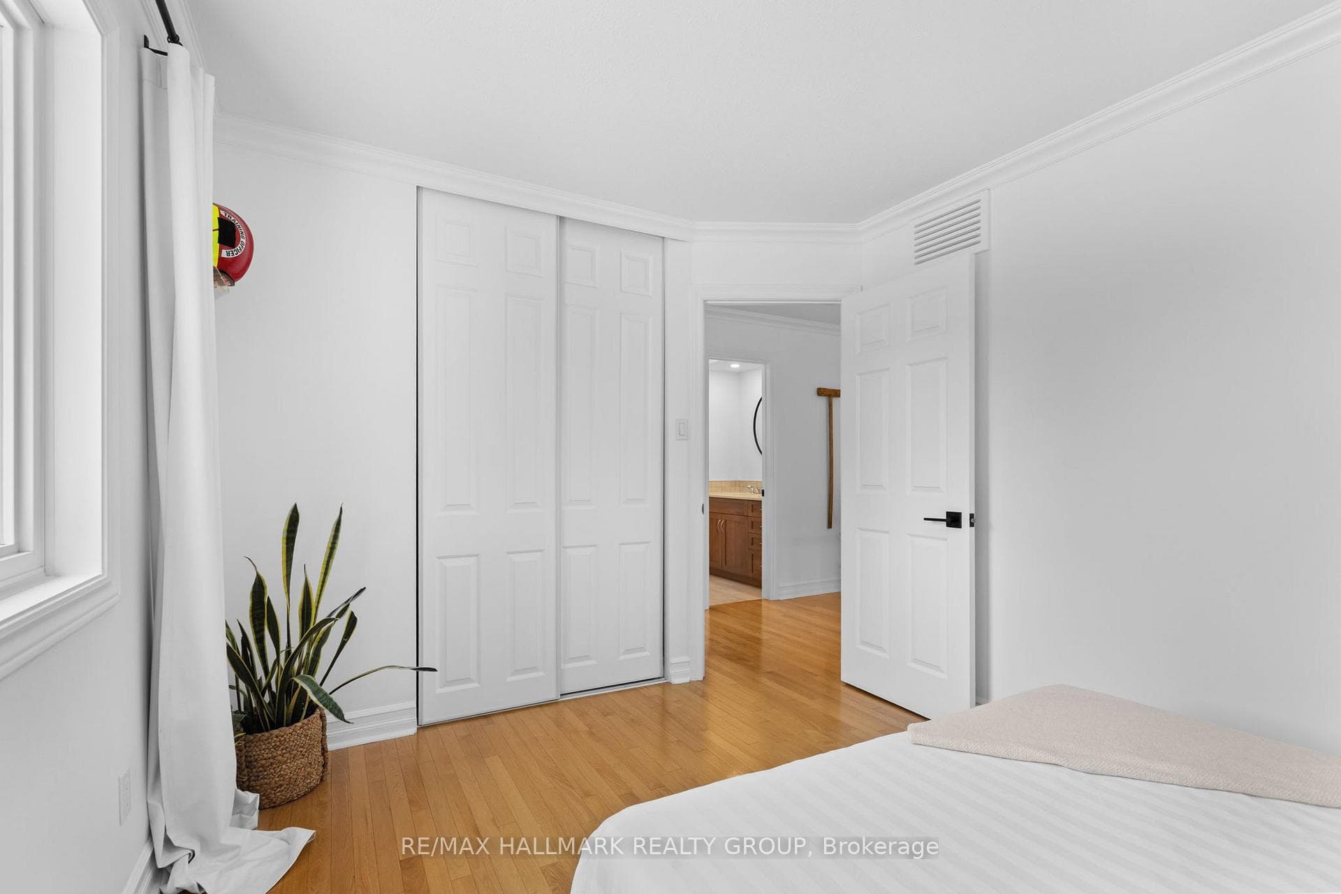 Bedroom with closet and hallway access