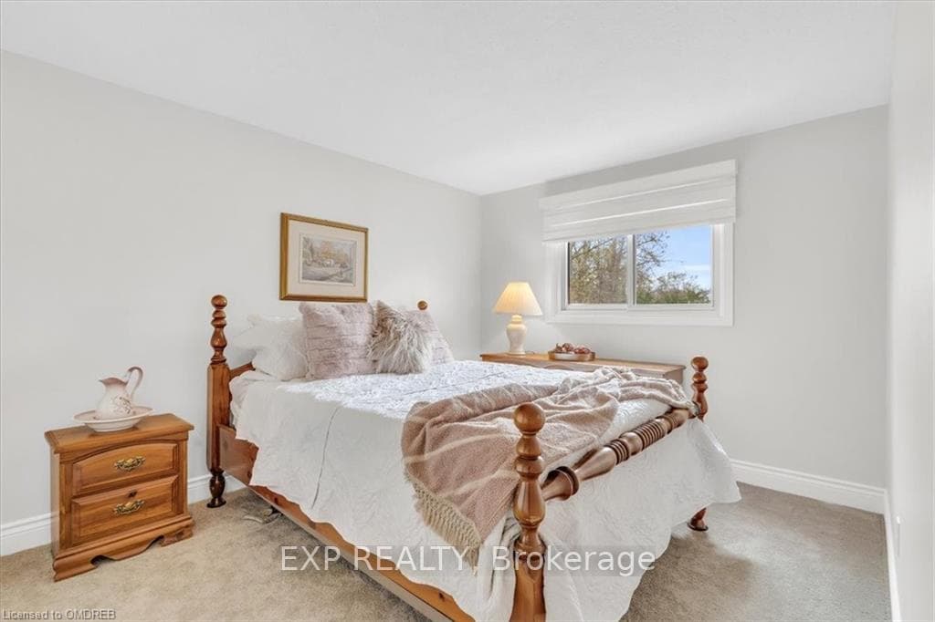 Bedroom with closet and large window