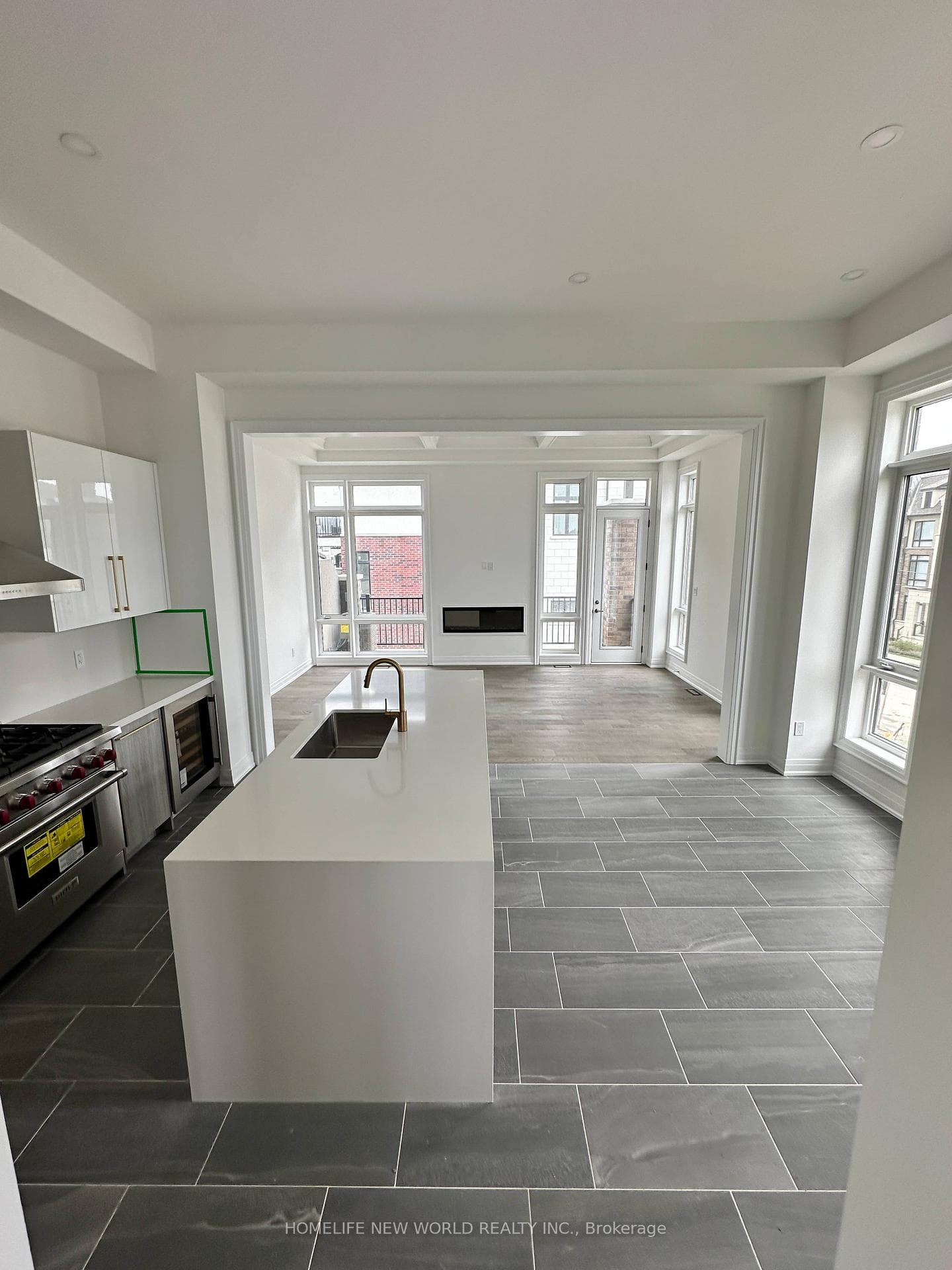 Living room walk out to Balcony with BBQ hookup