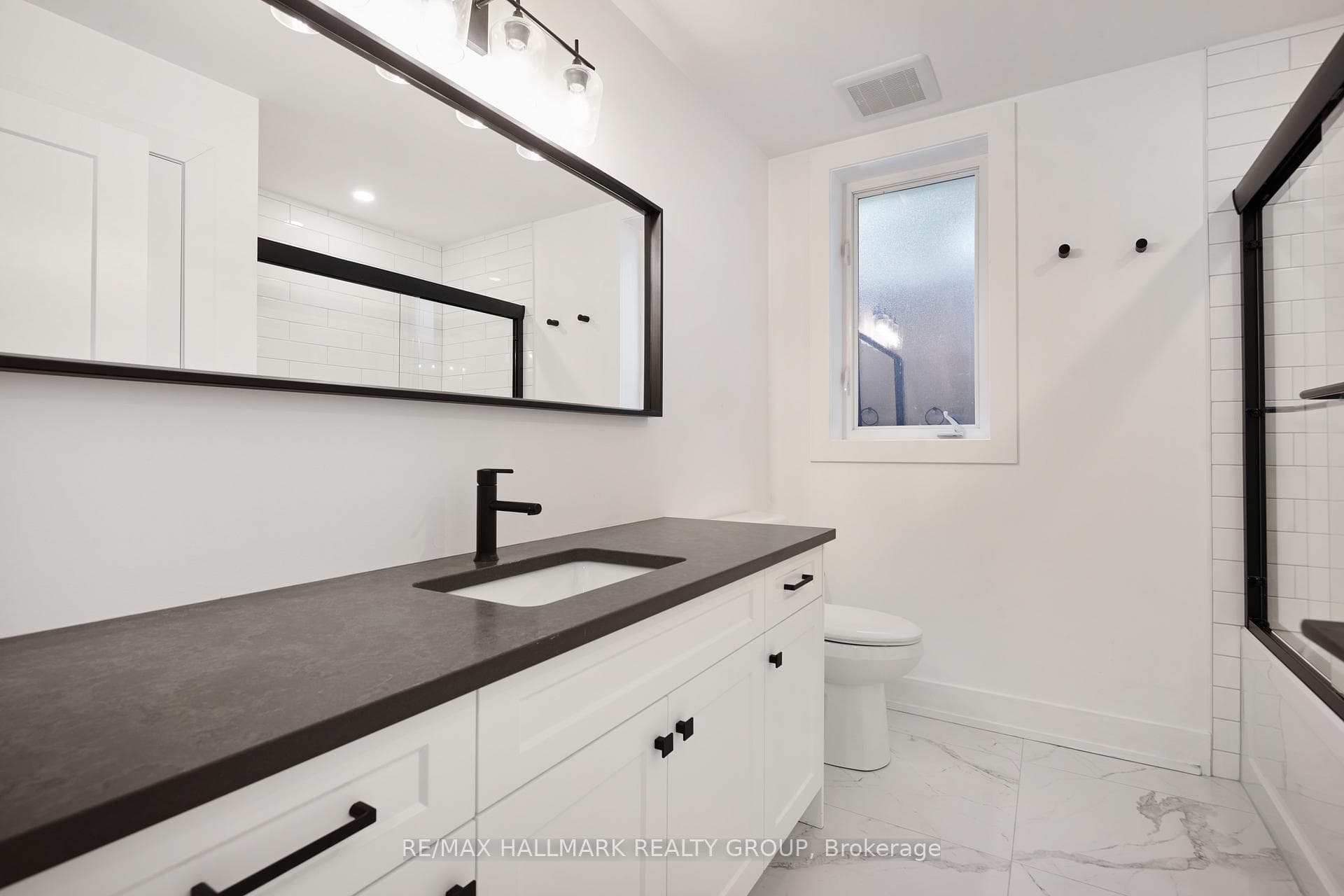 BASEMENT | bathroom, bathtub, linen closet