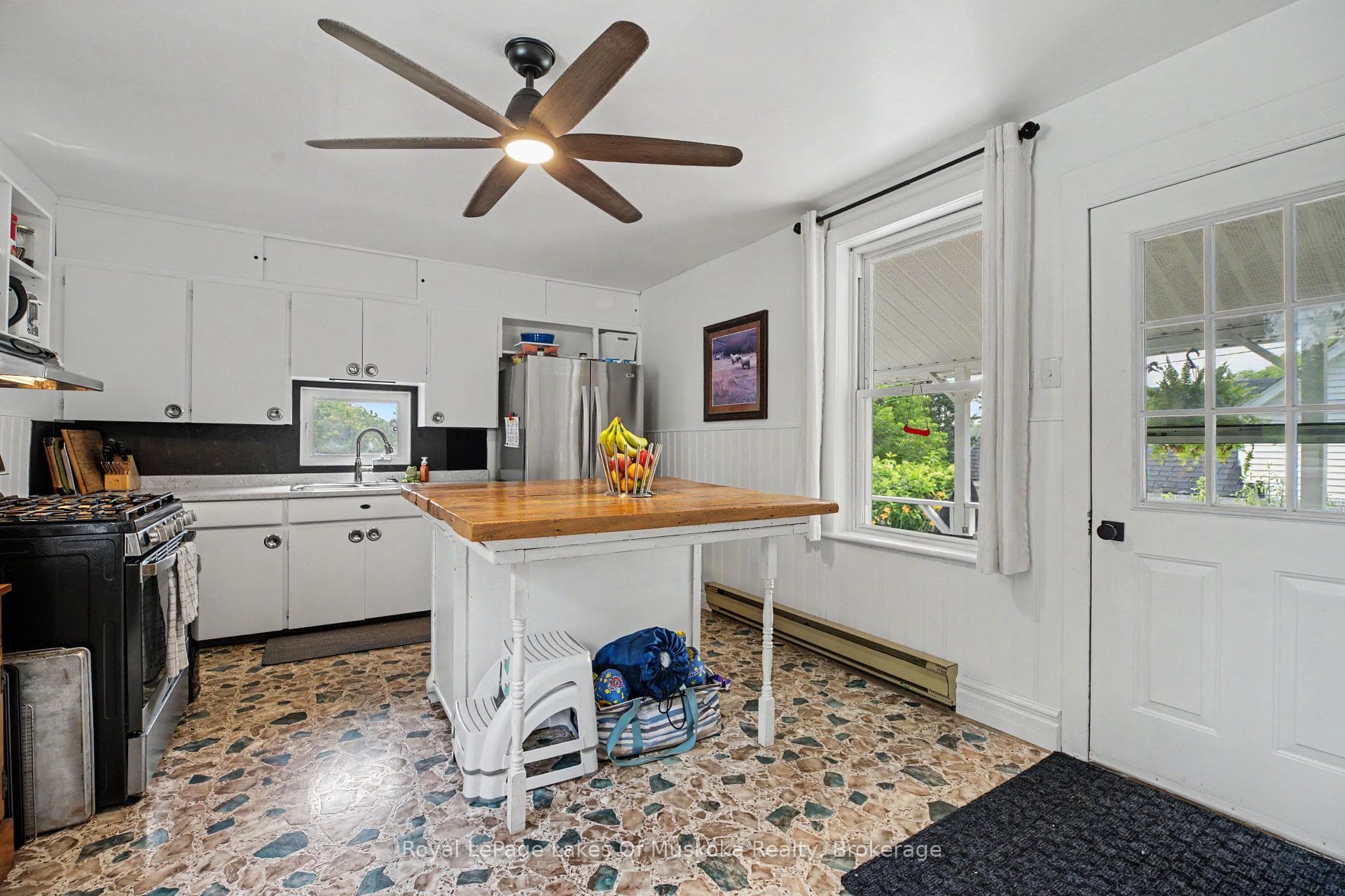 Kitchen, with walkout to the backyard