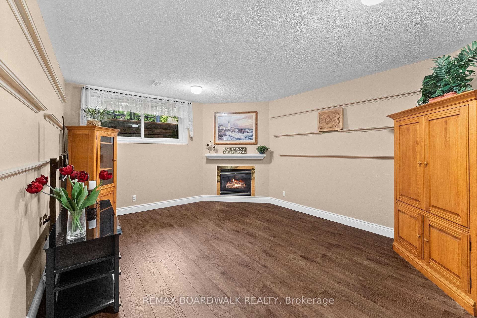 Basement w/large windows & fireplace