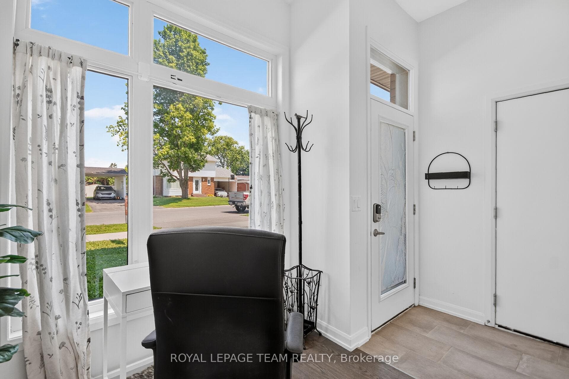 Oversized windows w/transom for more natural light
