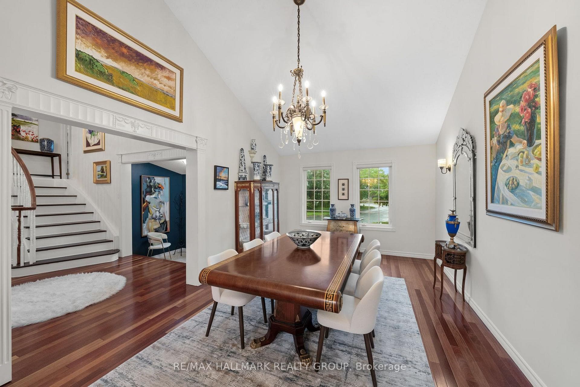 Formal dining room with cathedral ceilings