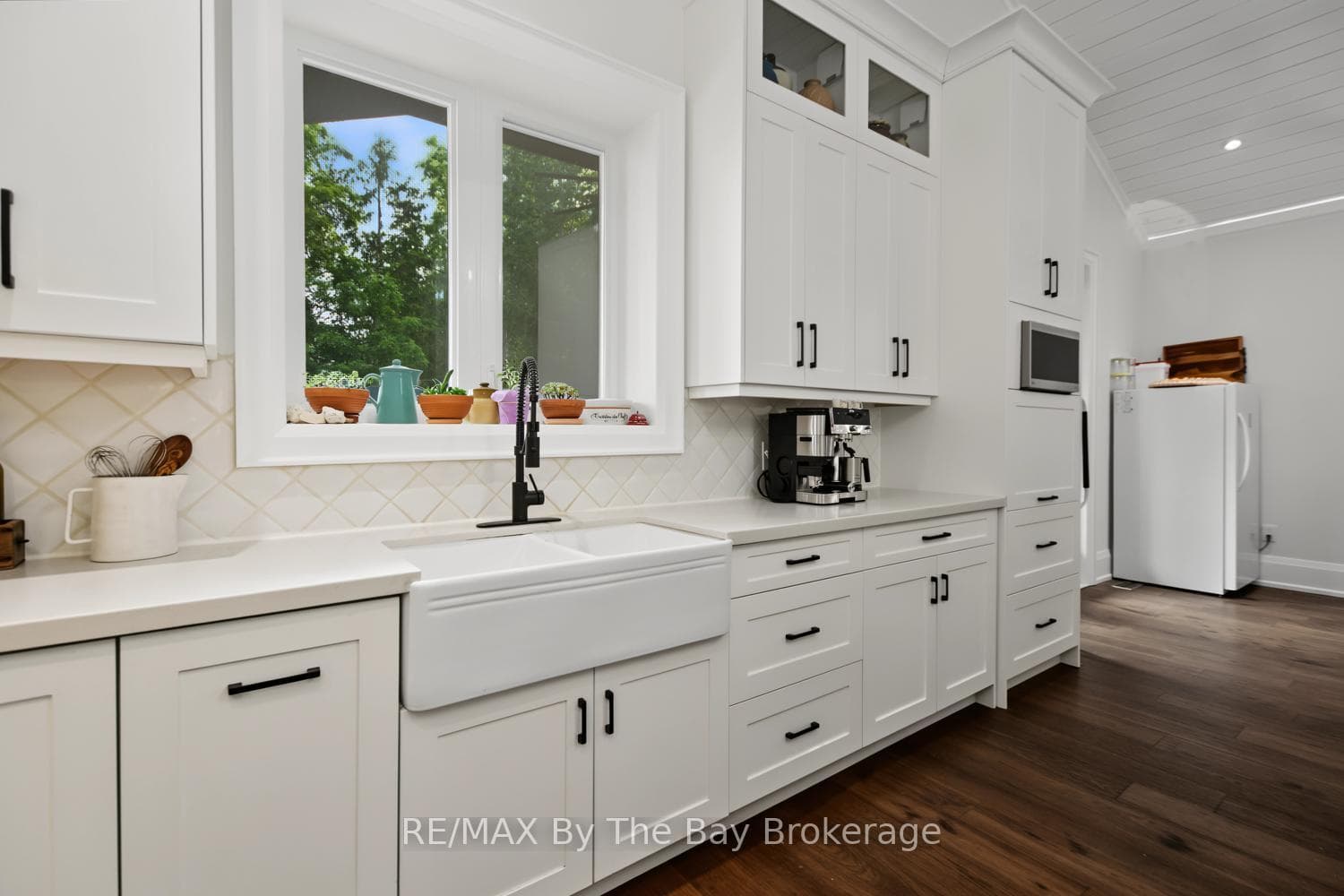 Farm House Sink Over Looking Deck Area