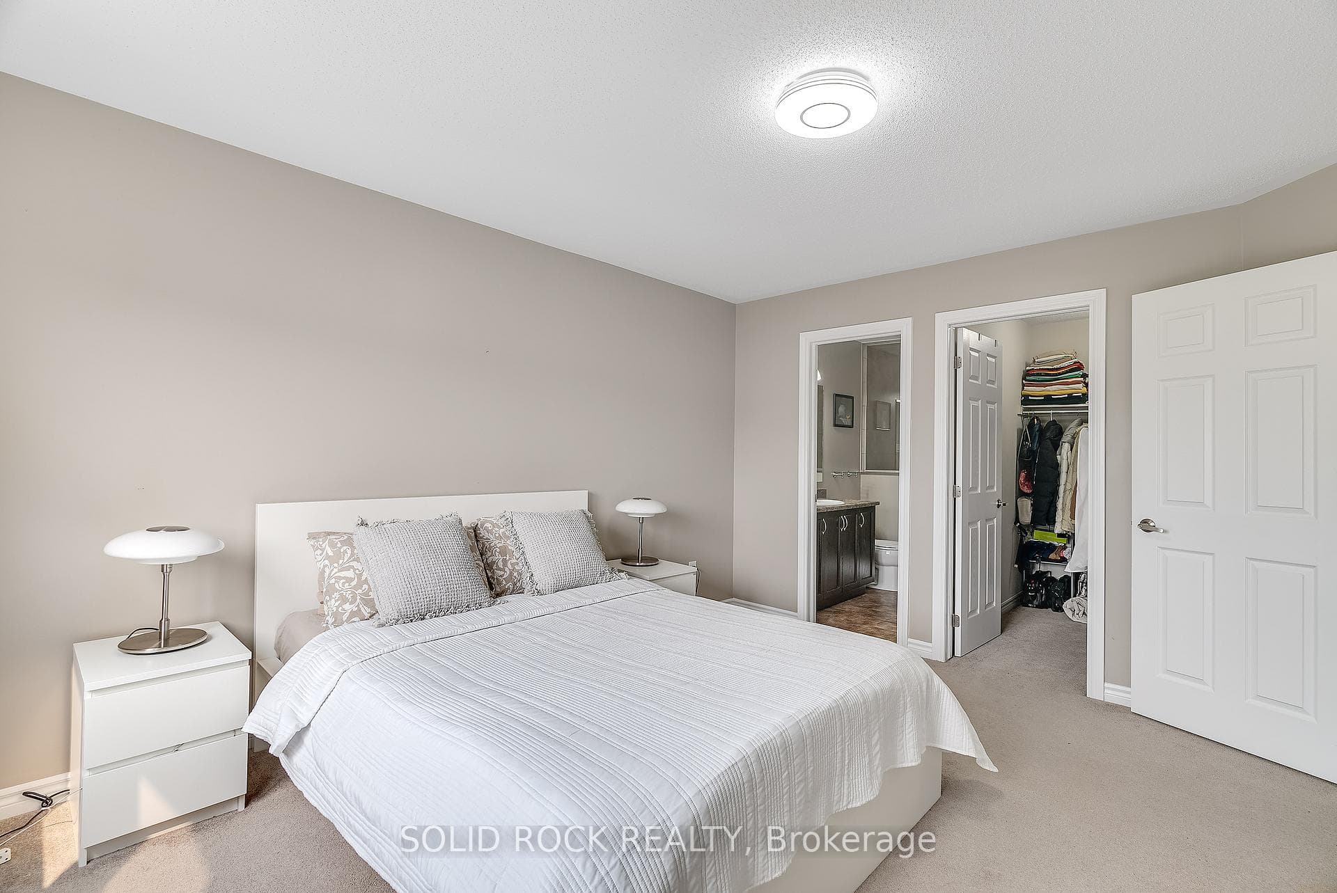 The primary bedroom offers a walk-in closet