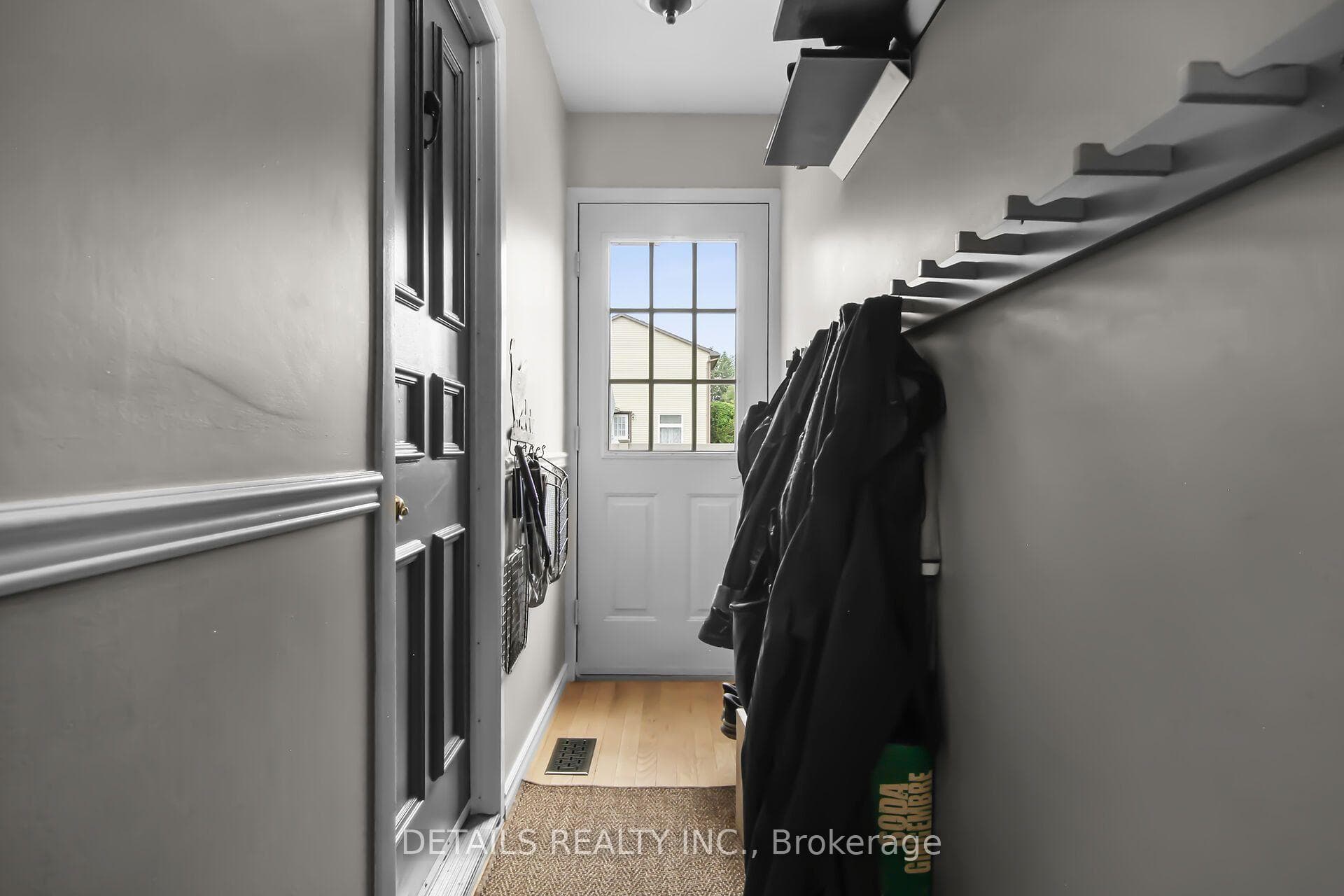 Mud room with access to garage and backyard