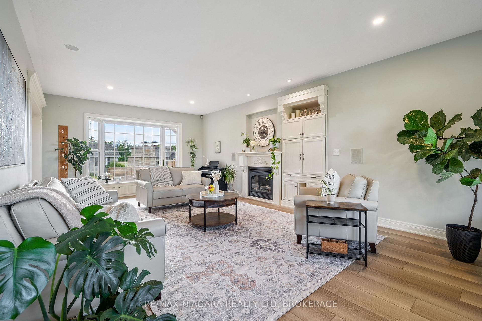 Cozy gas fireplace in bright living room