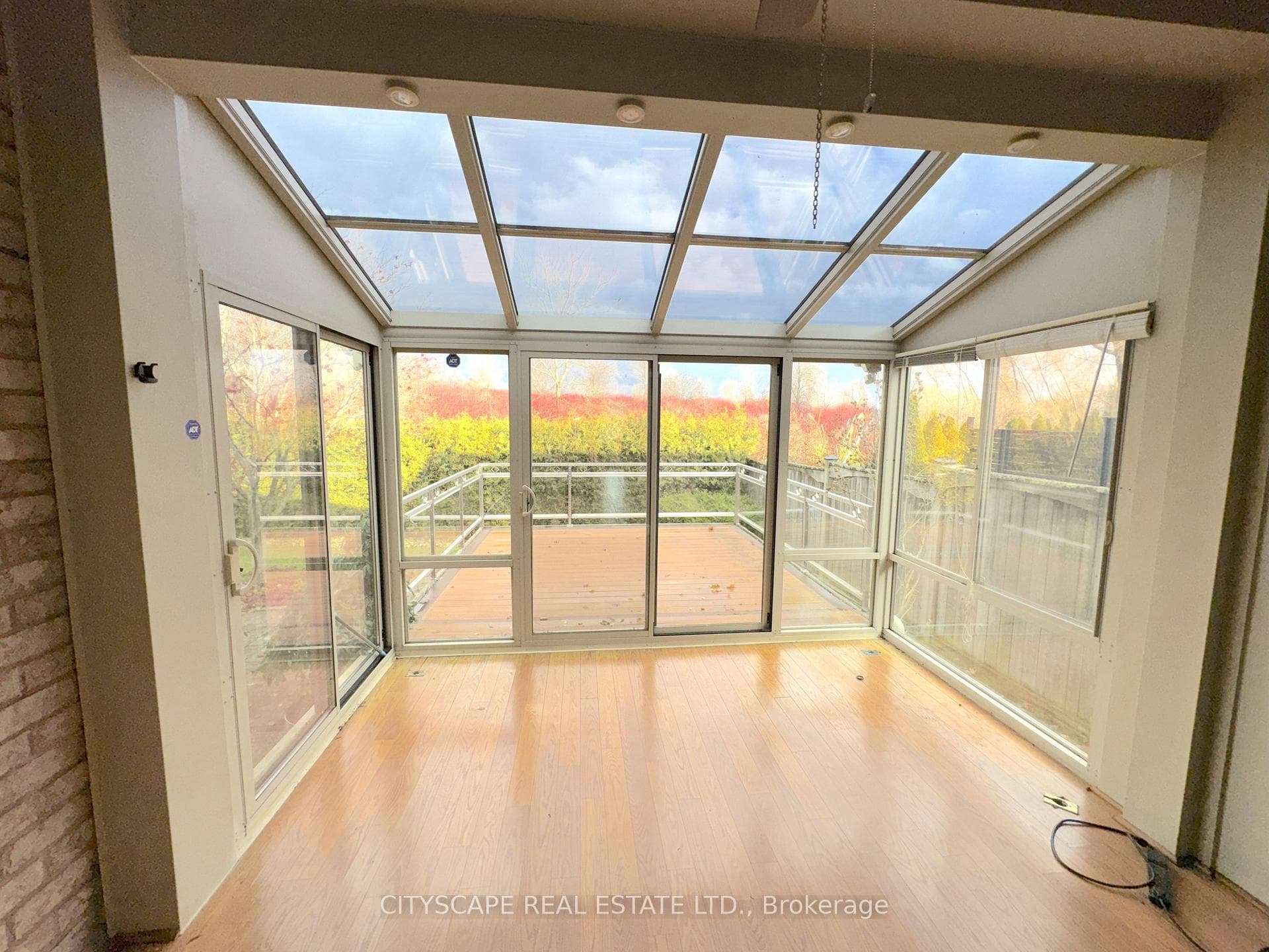 Sun Room with Walk-Out to Deck