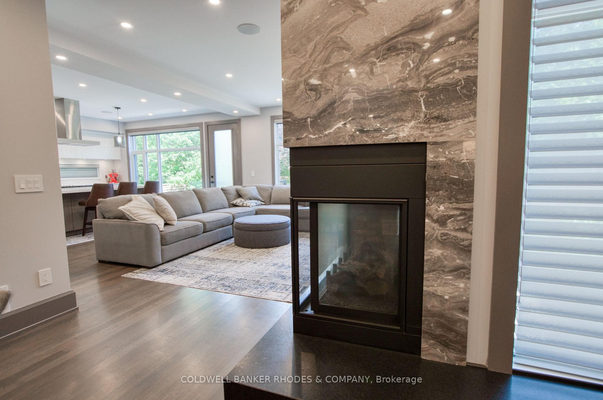 Two sided corner gas fireplace
