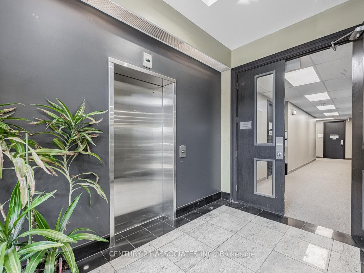 Double door entry located across from elevator