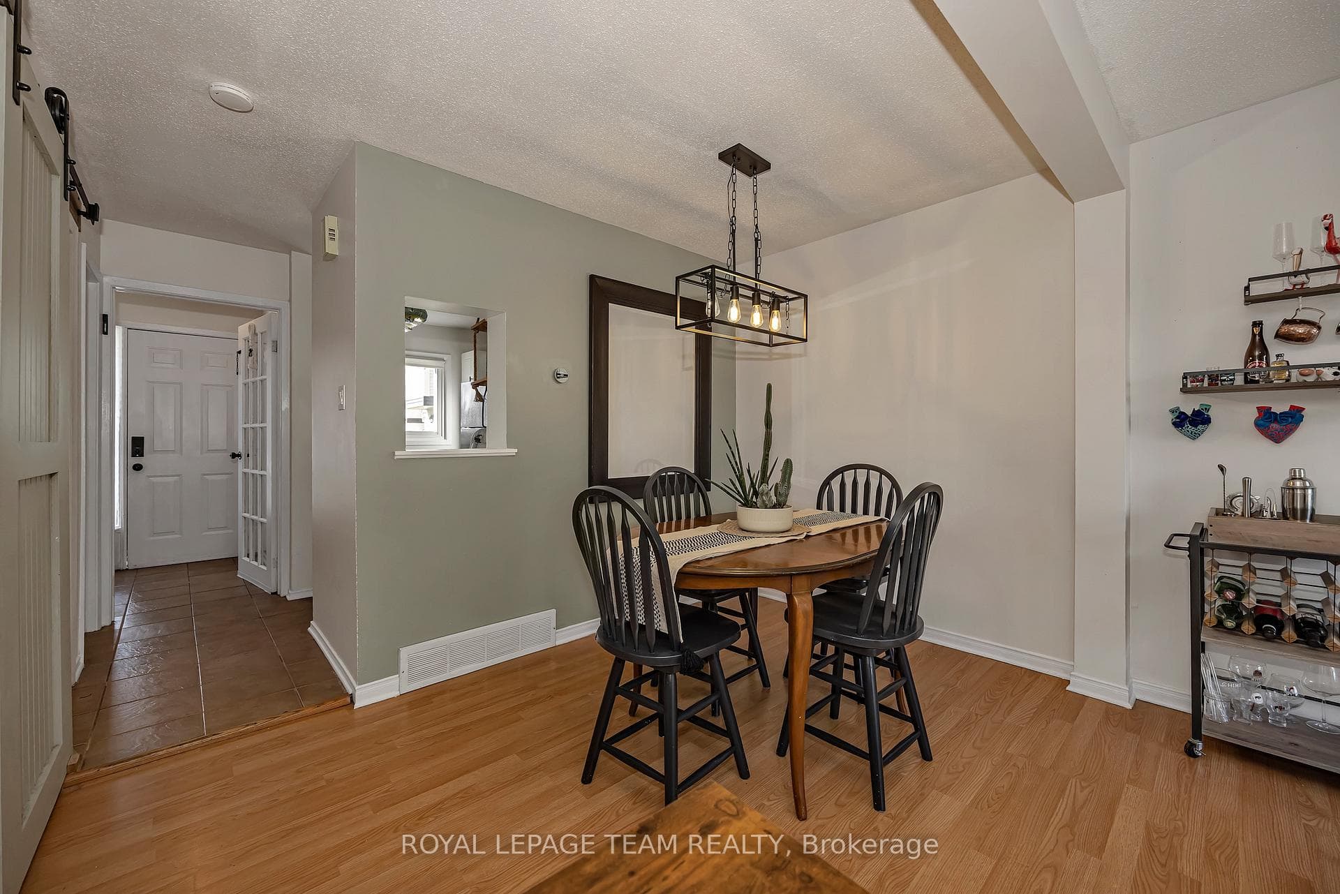 Dining Room with Passthrough Window to Kitchen