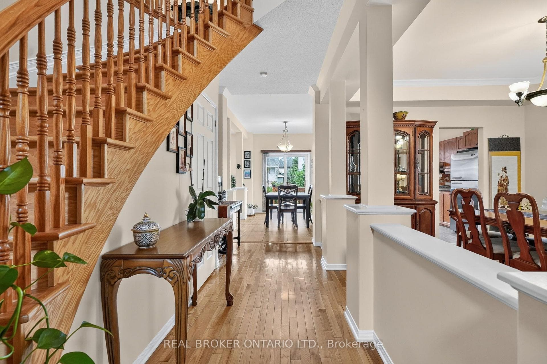 Sweeping hardwood floors throughout main level