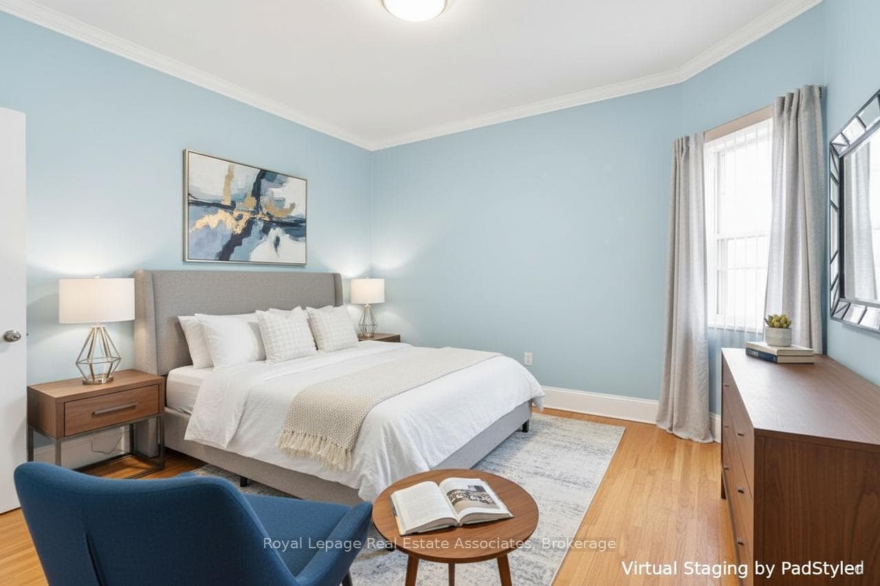 STAGED MAIN FLOOR BEDROOM