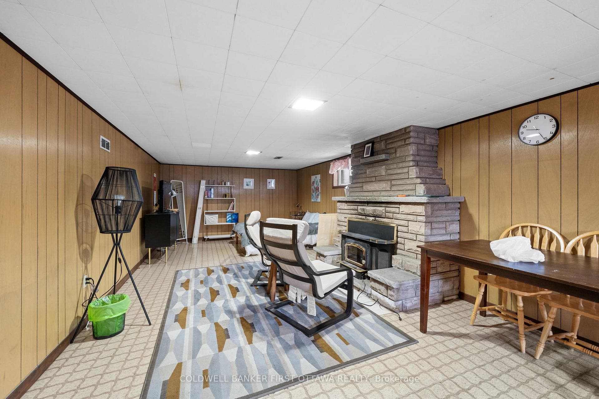 Wood fireplace and ample space for fitness area