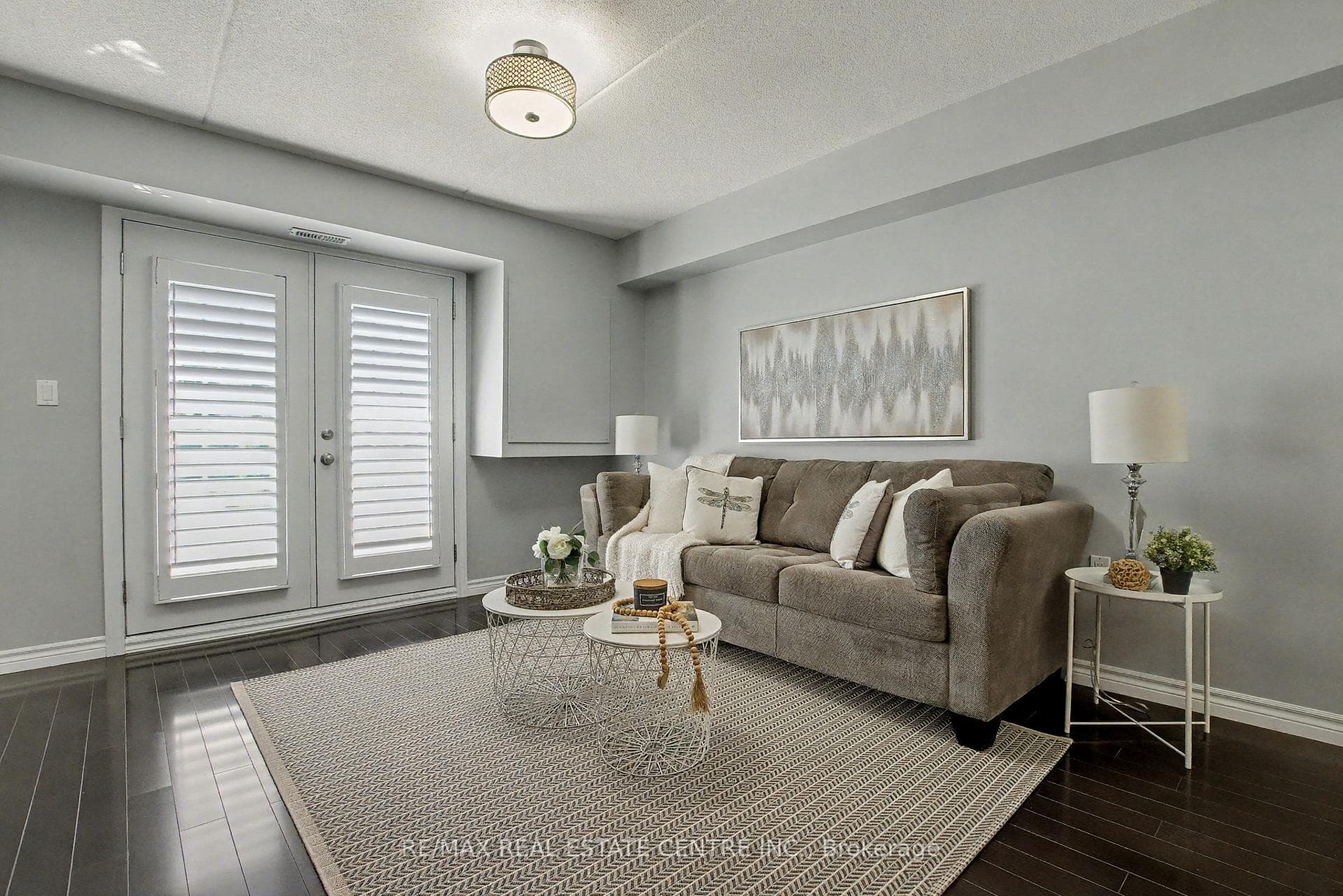 Living room with walk-out to private balcony