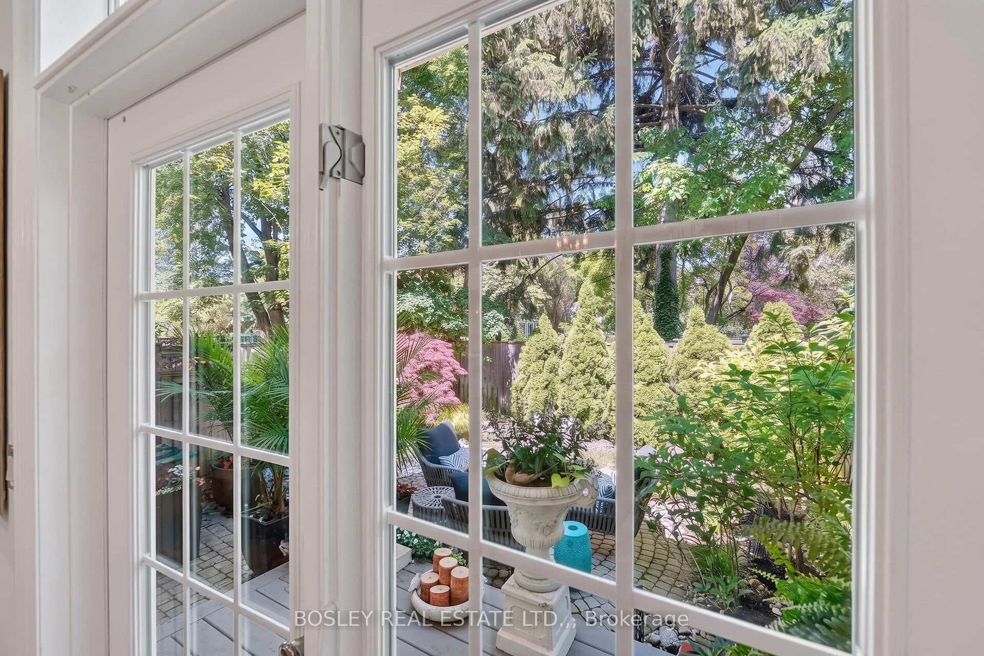 Wall out to covered deck overlooking a