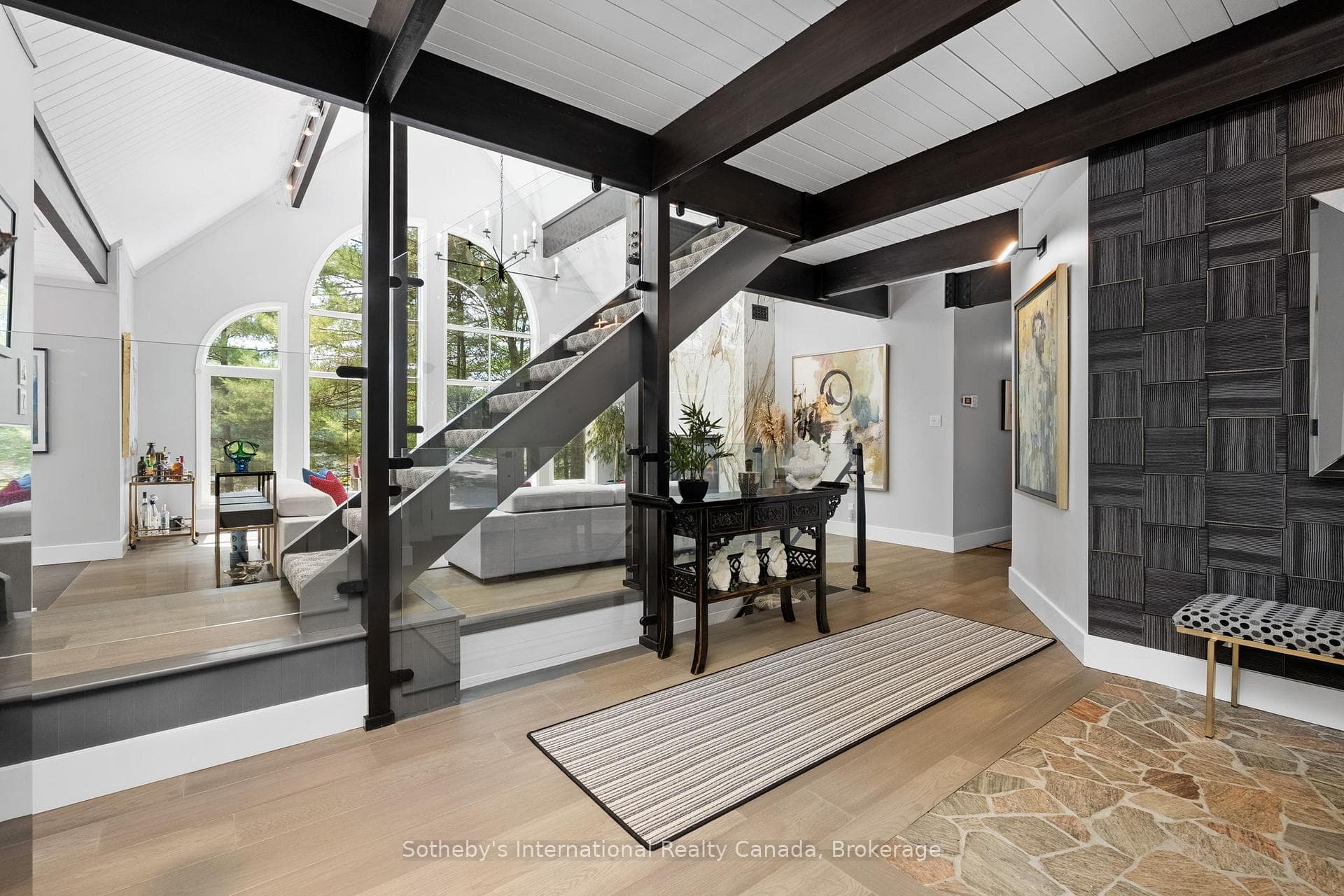 Glass Railings allow views thought the Living Room