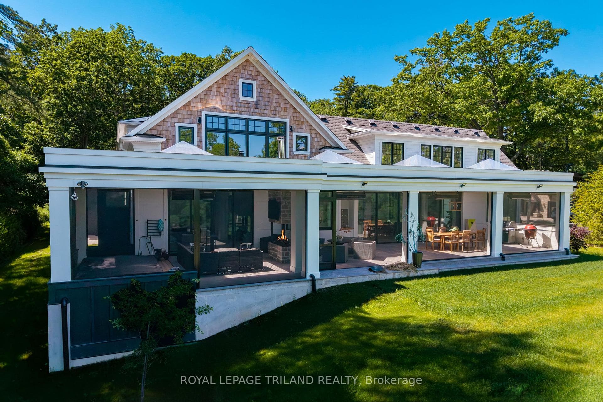 Gas heated screened-in sunroom can be used yr rnd