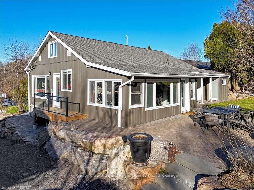 Back of property with a patio area