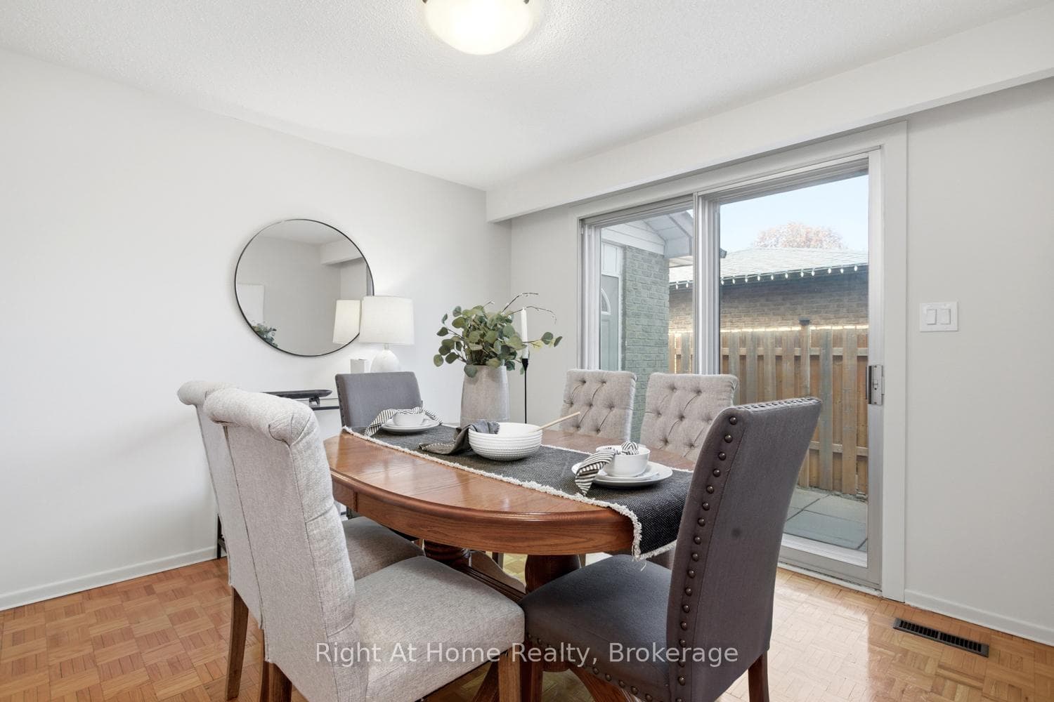 Separate dining room with walkout to side yard