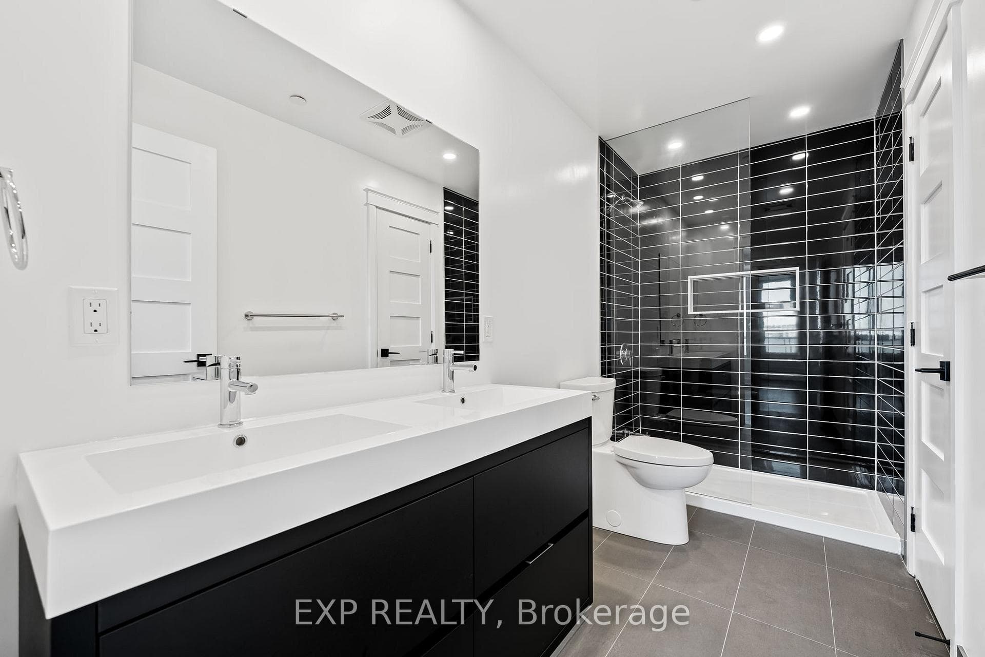 Ensuite Bathroom with double sink and large closet