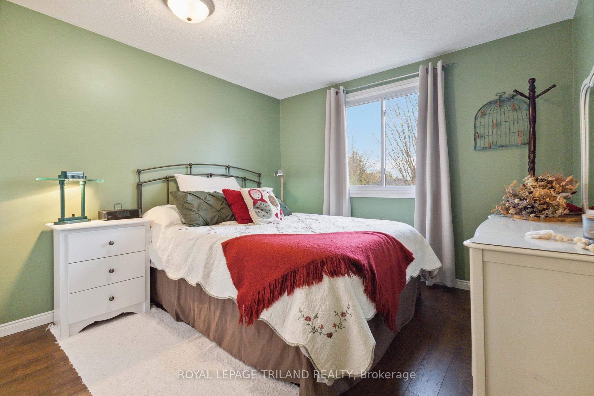 Bedroom #2 with large window into backyard