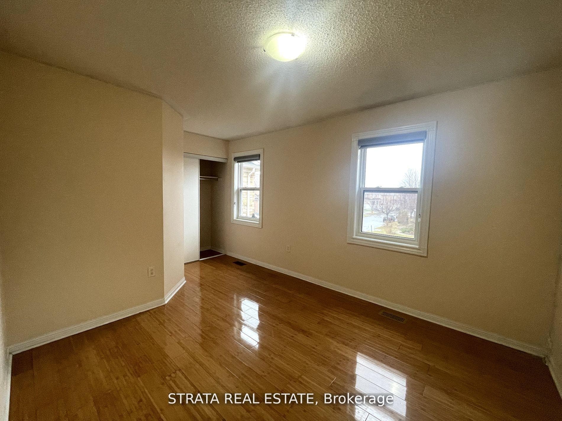 Spacious Bedroom with Closet and No Carpet