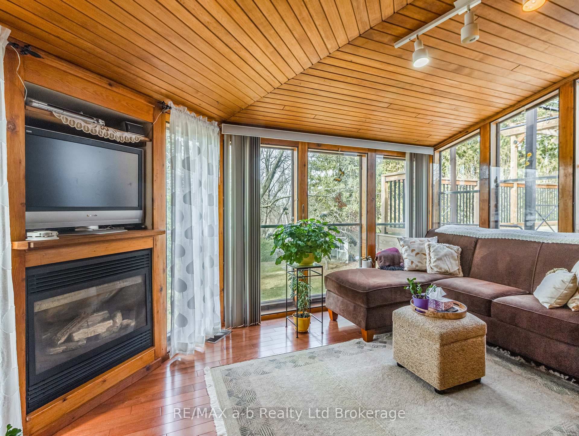 Sunroom with gas fireplace