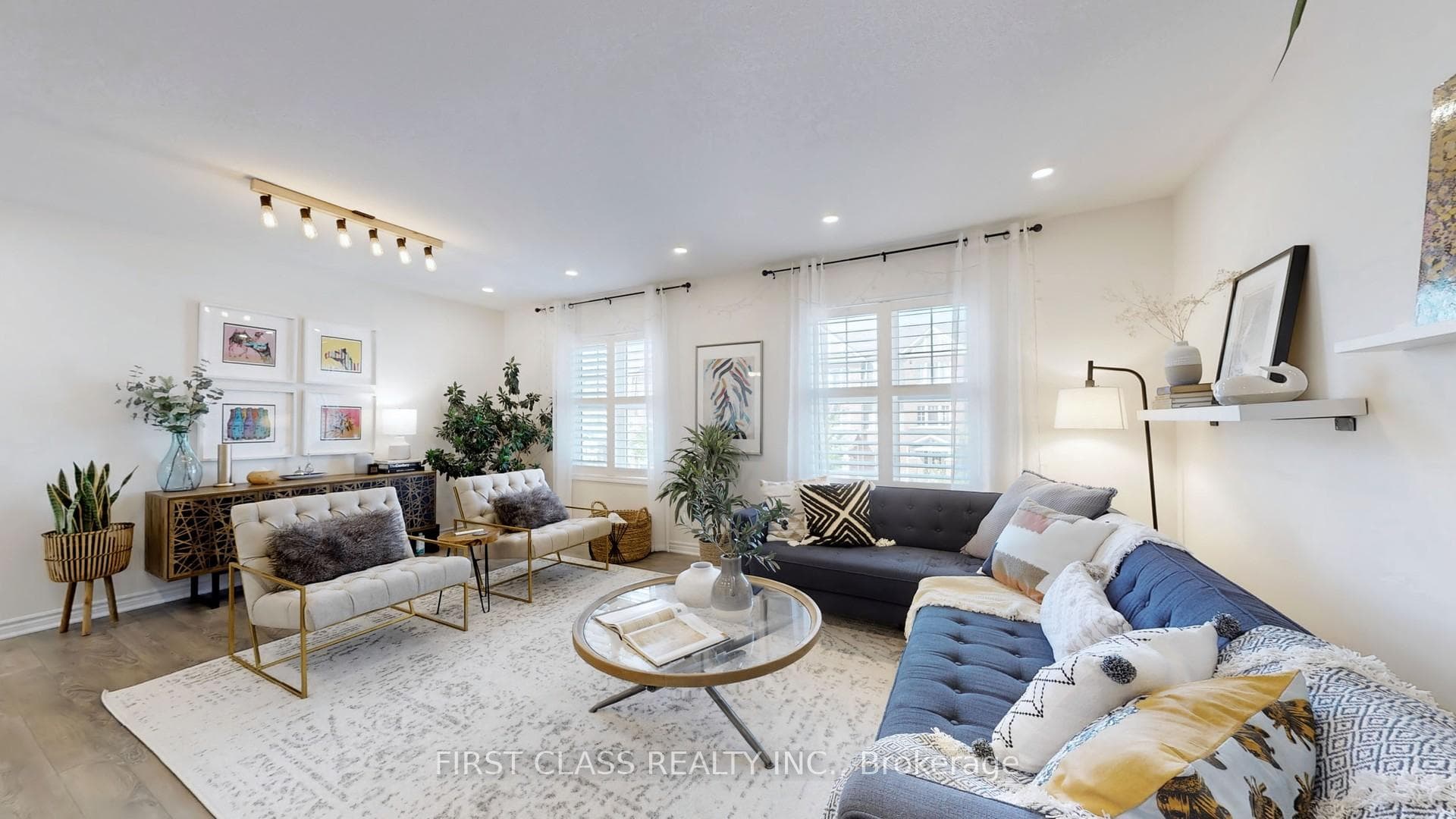 Large Bright Windows With Soft Shear Curtains
