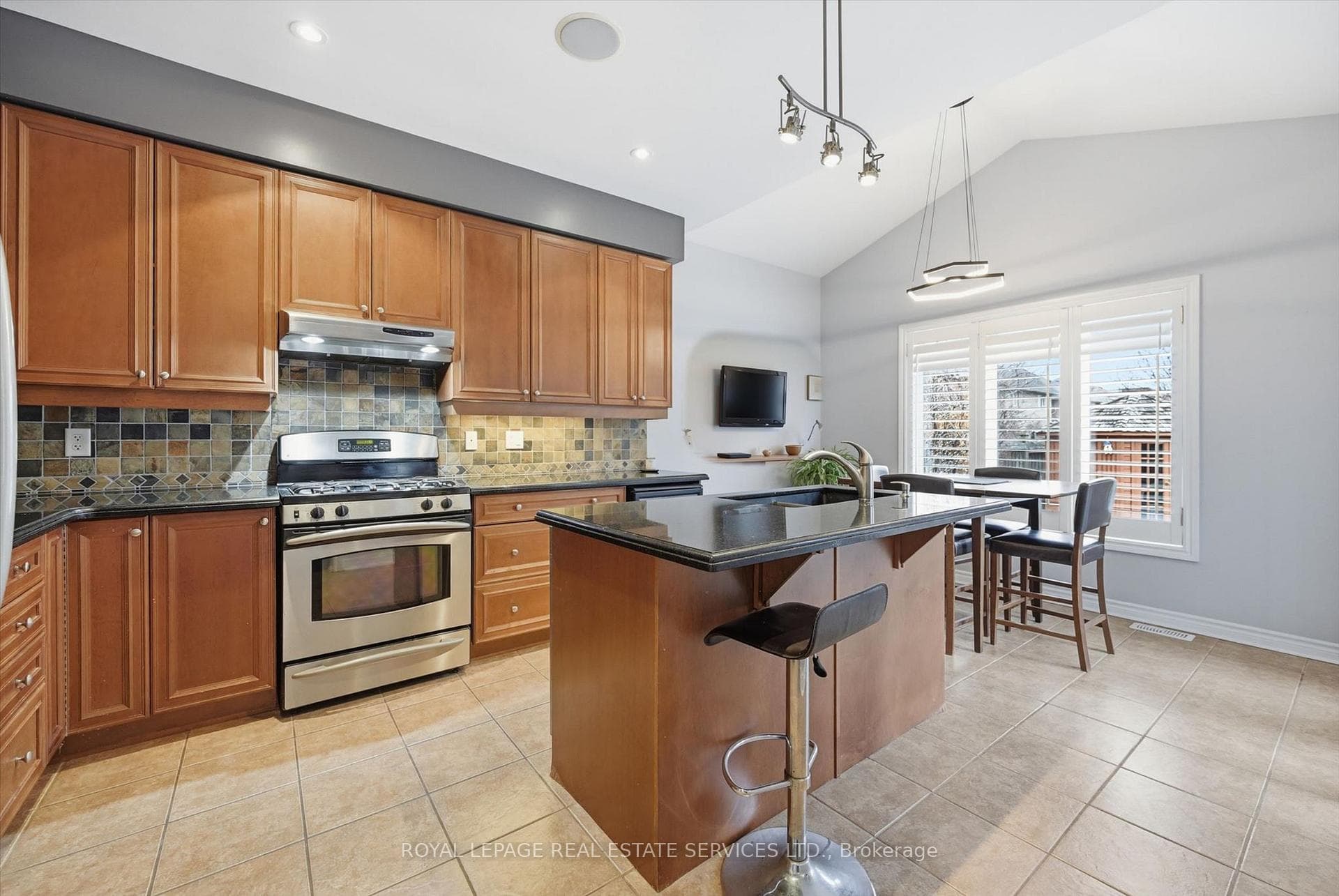 Gourmet Kitchen Equipped with Granite Countertops