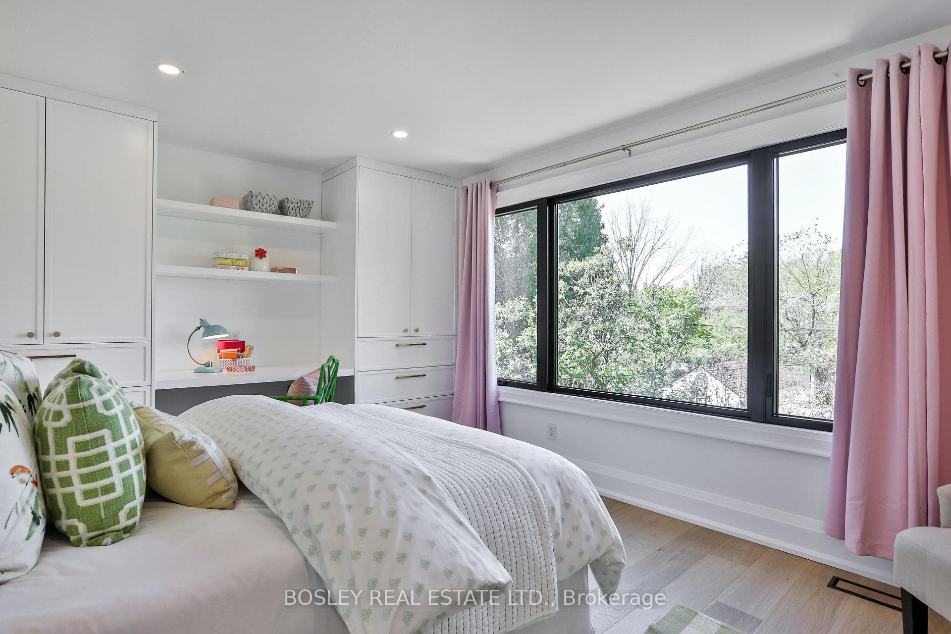 2nd Bedroom overlooks treetops and backyard
