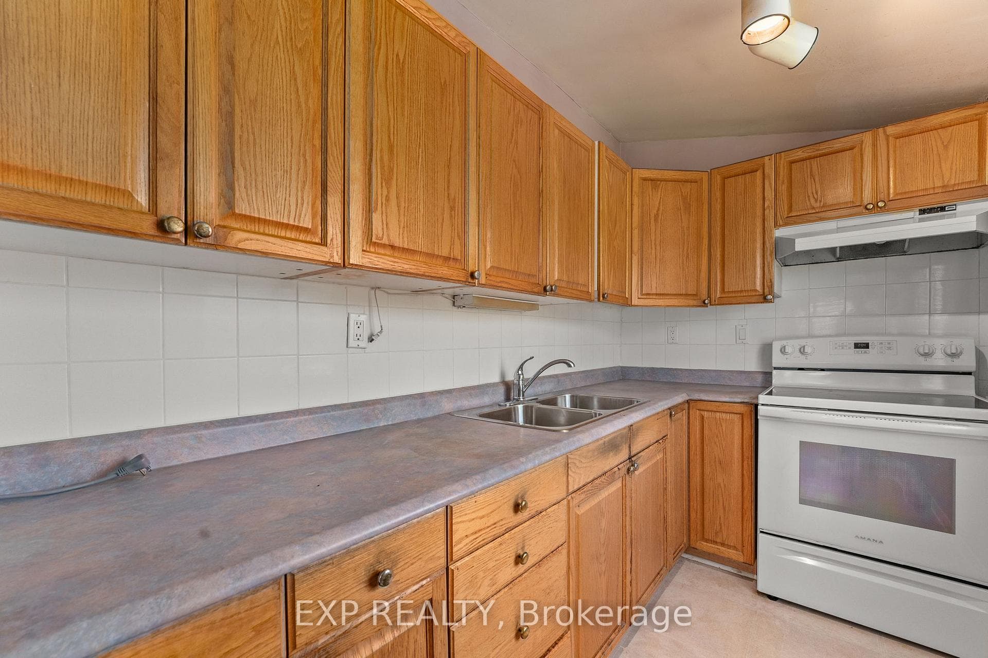 Kitchen With Walk-Out To Deck