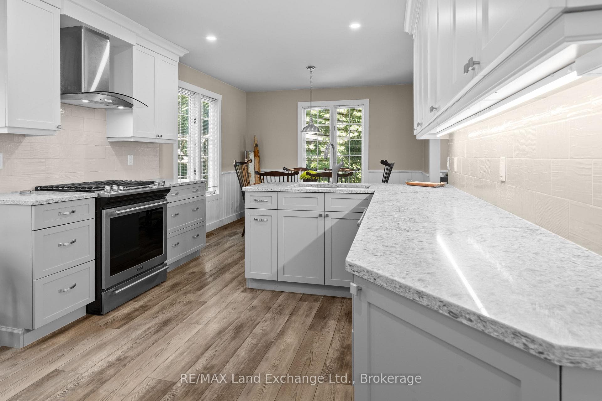 Updated Kitchen-white and grey cabinetry w/ quartz