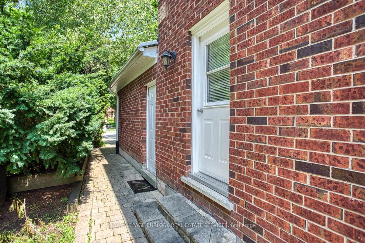 Side entrance to laundry and garage.