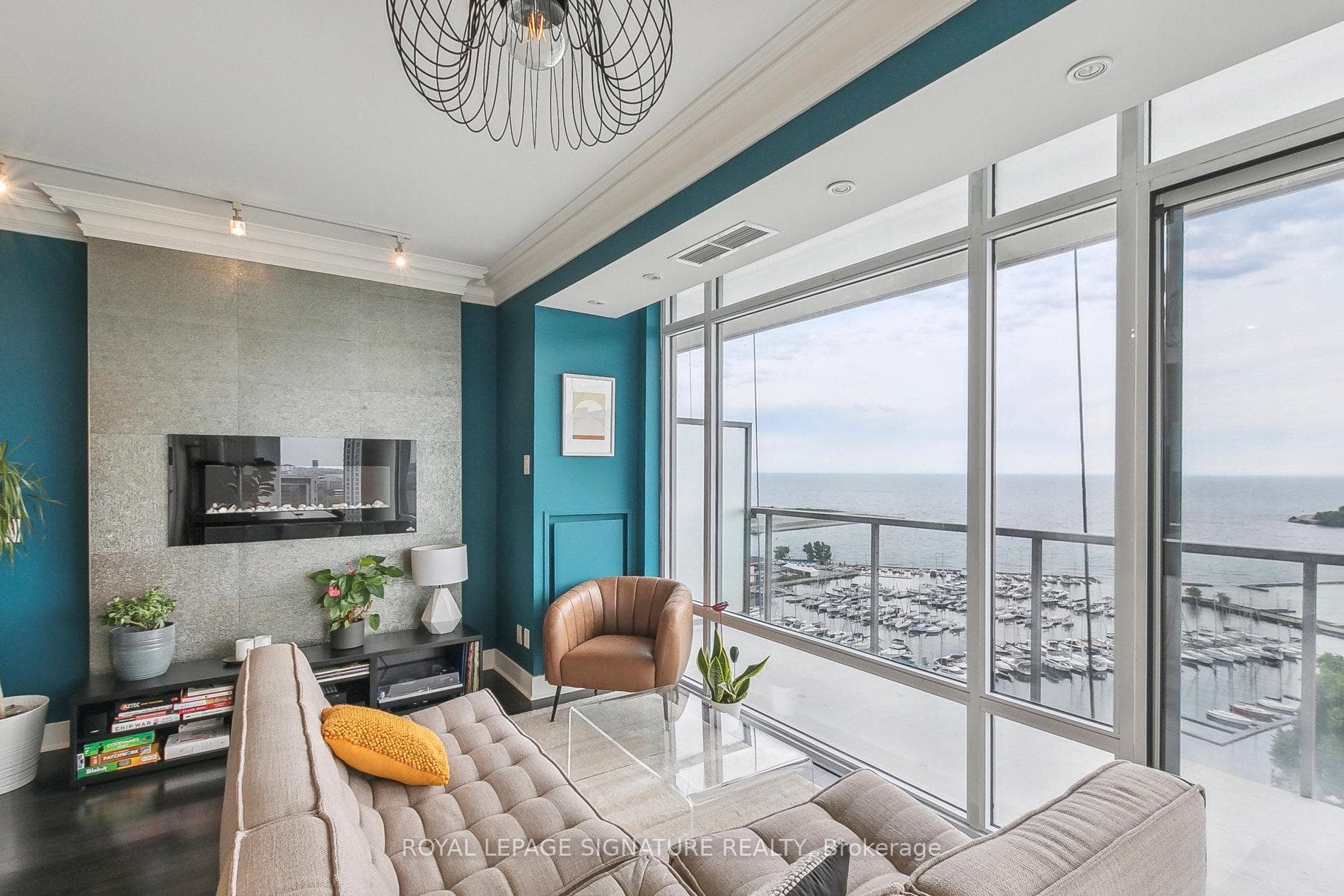 LIVING ROOM WITH ELECTRIC WALL FIREPLACE