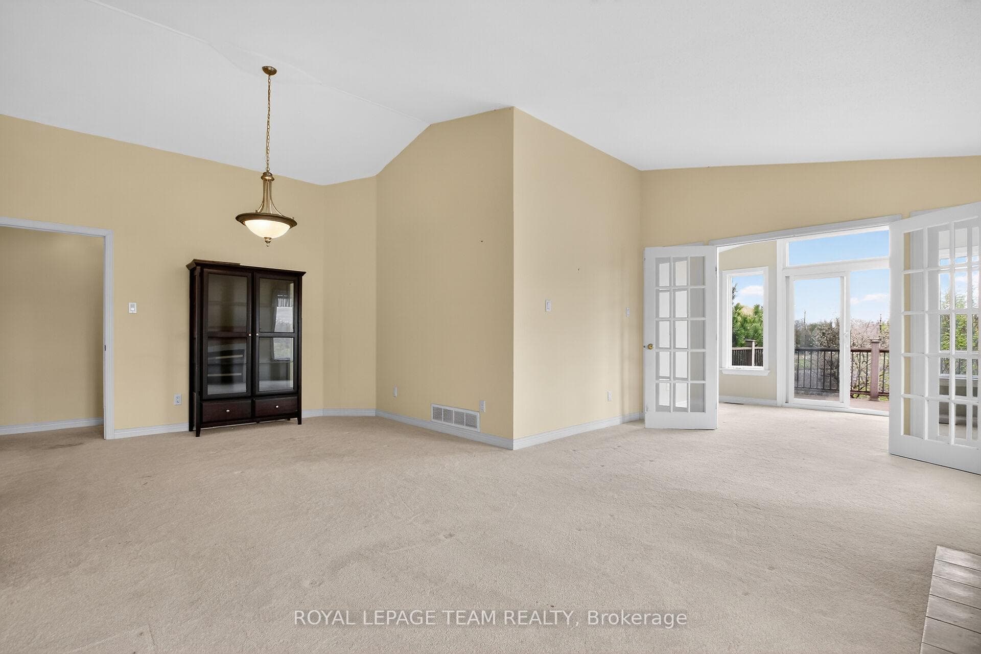 Open concept design w/solarium in distance