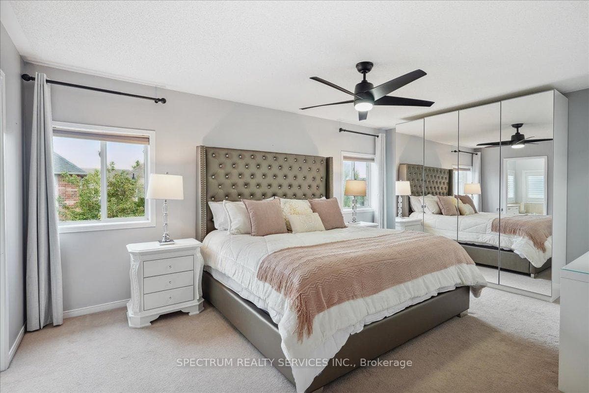 Principal Bedroom - double built in armoire