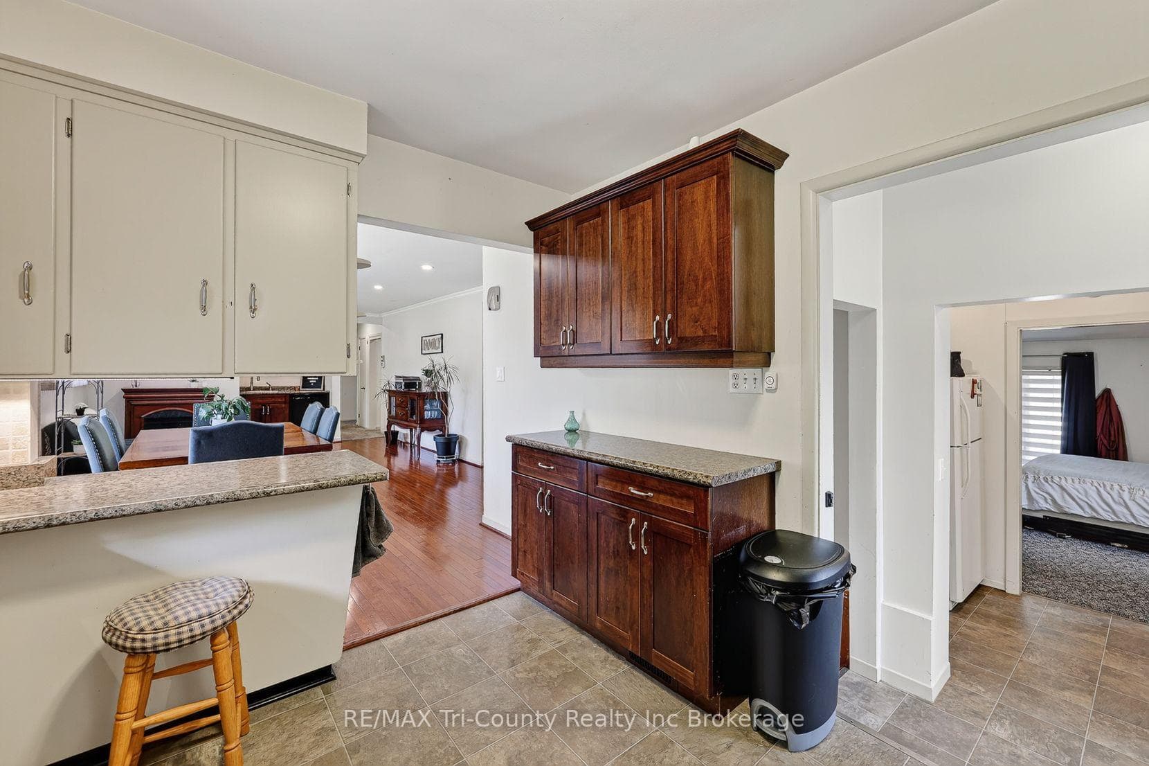 leading in to kitchen from dining area