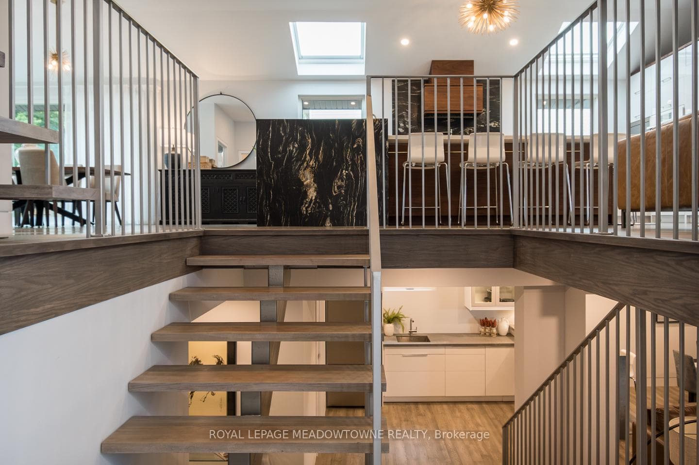 Solid Oak floating treads throughout