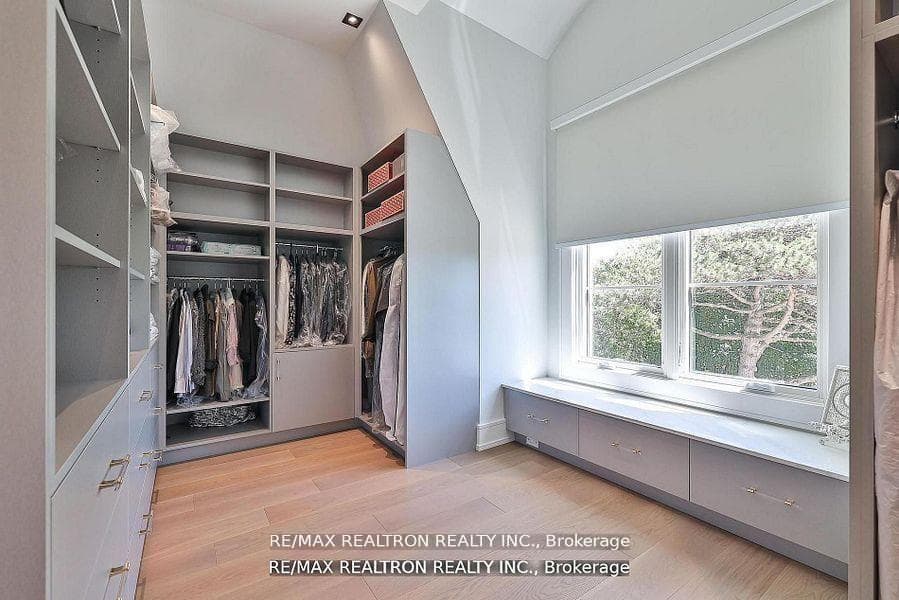 Large Walk In Closet with Natural Light