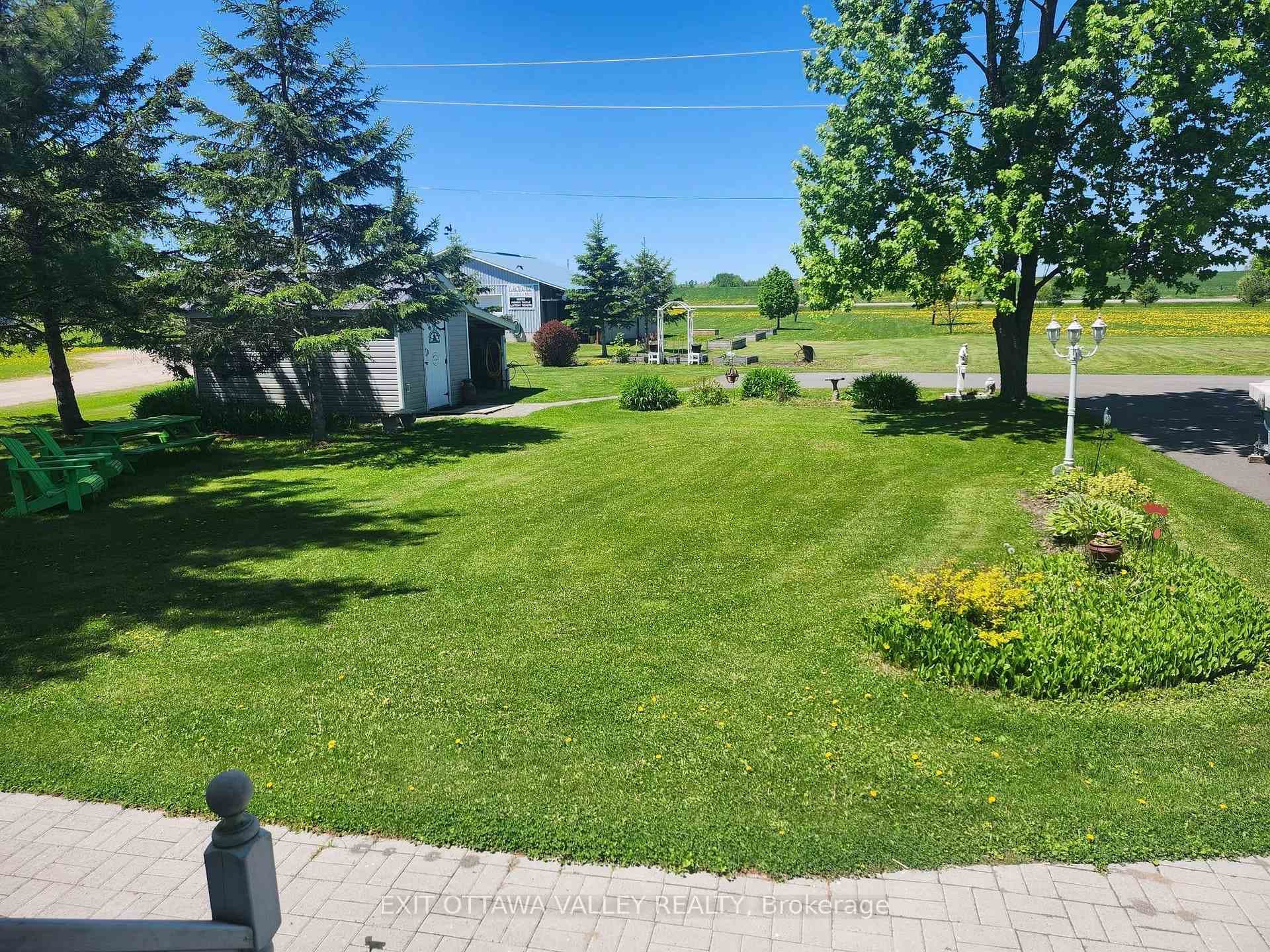 Front yard towards garden and driveway. Front Shed