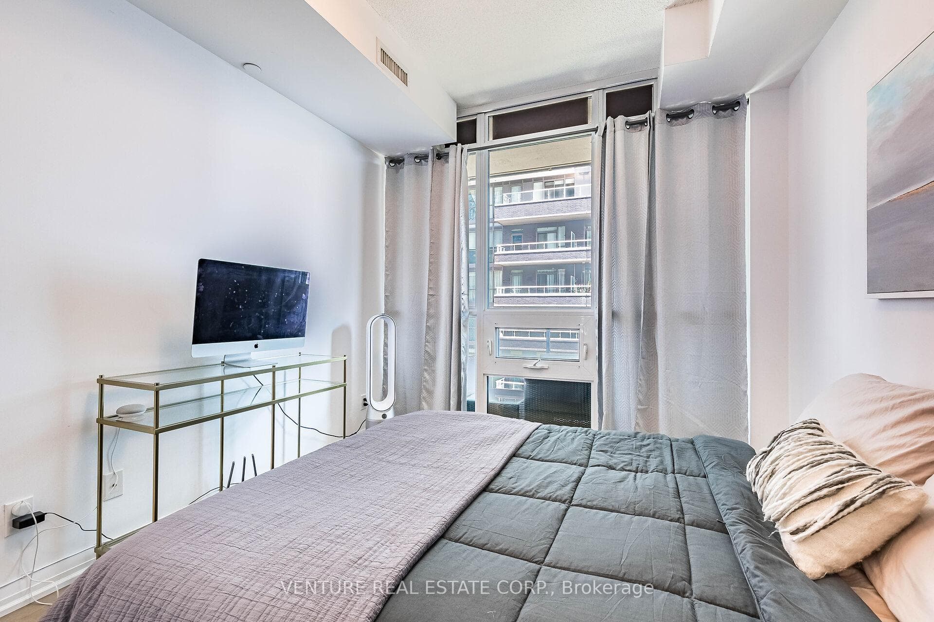 Primary Bedroom with Floor to Ceiling Windows